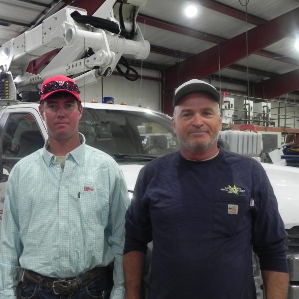 When they aren’t helping stranded motorists, Loup Valleys Rural Public Power District’s Nick Schaaf (left) and Bruce Koch keep the lights on.